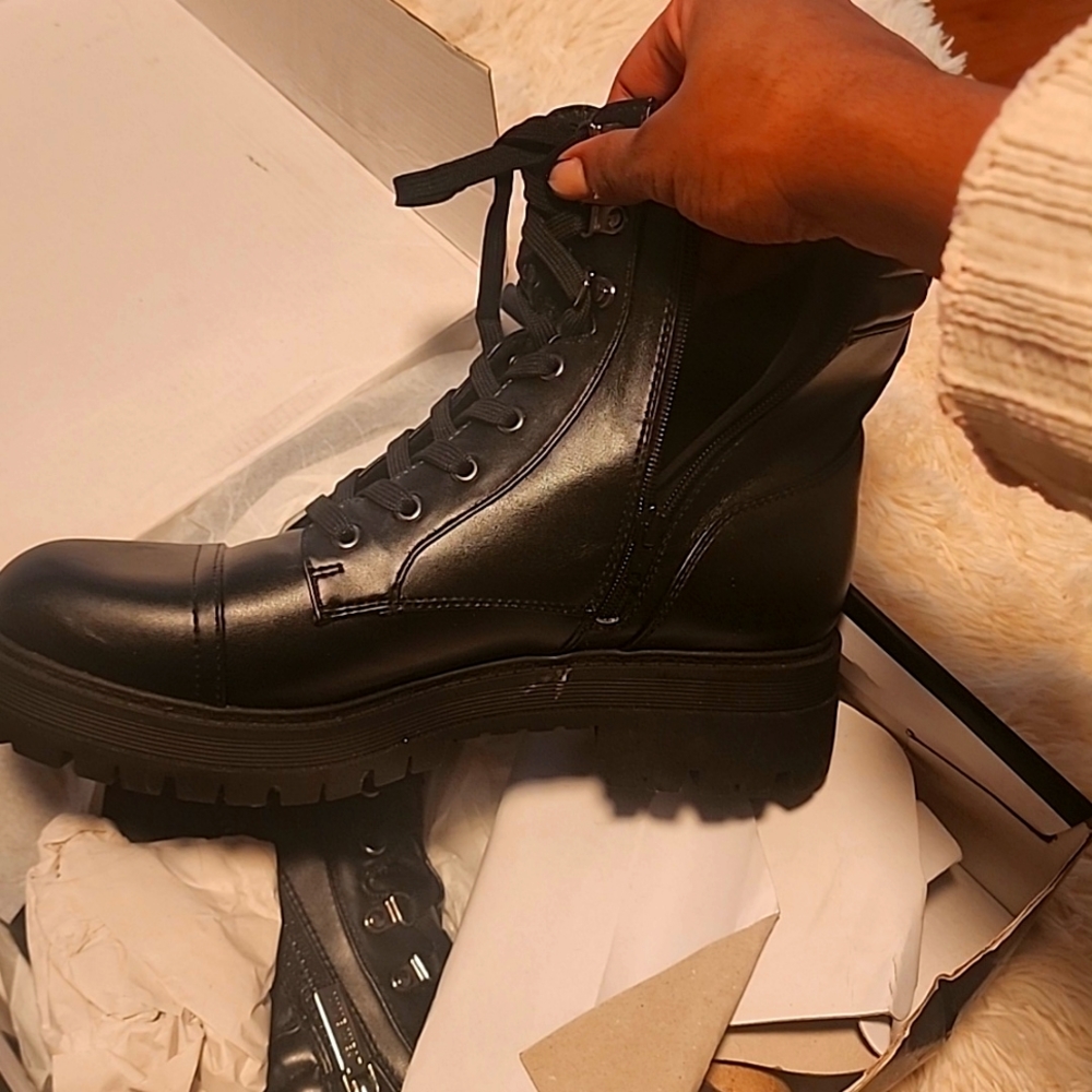 Black faux leather combat boots